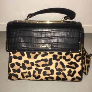 Leopard and black hand bag